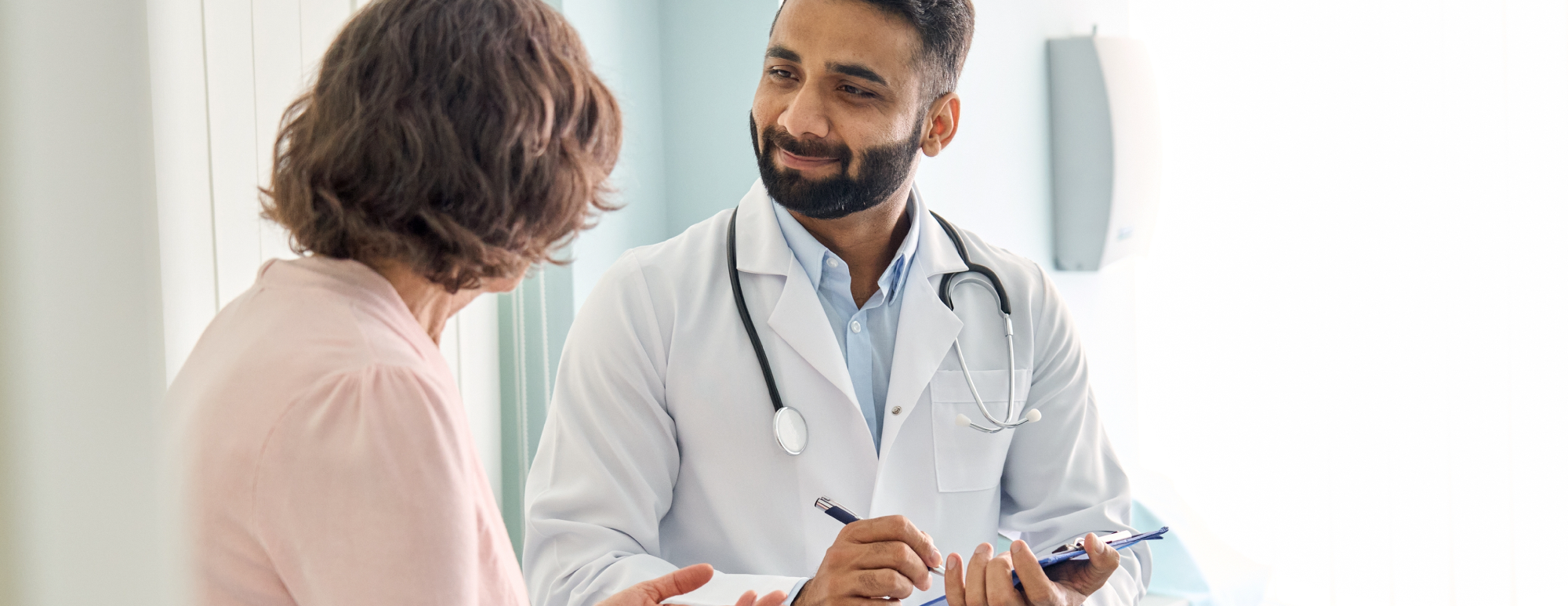 doctor and patient discussing dyslipidemia